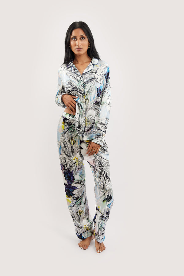 Our model wearing long-sleeve Rose Nilofar silk pyjama set on white background - front look - version two