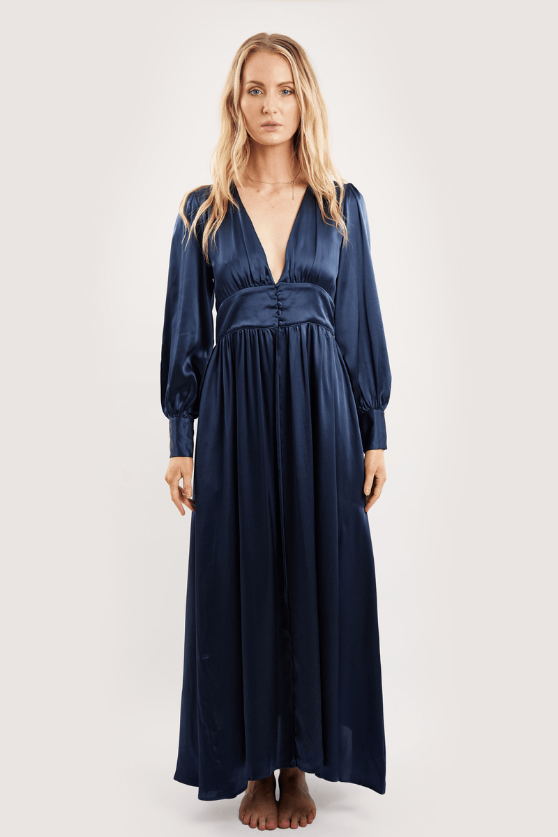 Our model wearing Coco Navy silk robe on white background - front look