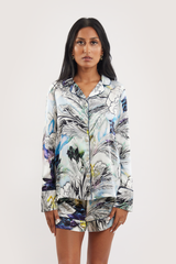 Our model wearing long-sleeve Iris Nilofar silk pyjama set on white background - front look